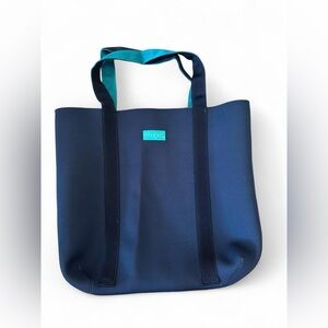 FITKICKS neoprene reversible tote in navy blue and bright teal waterproof